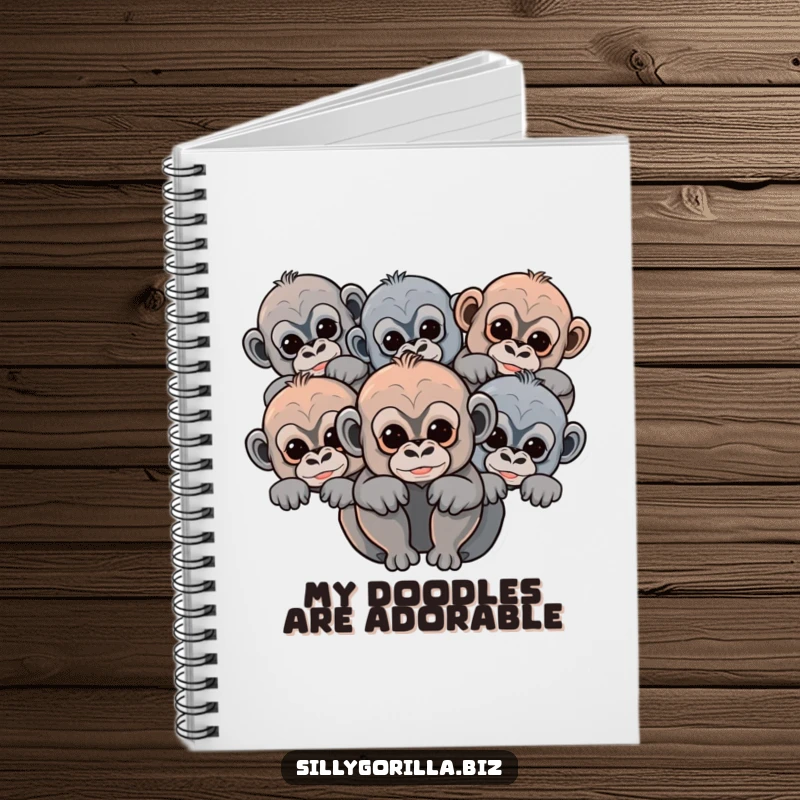 Funny baby gorilla notebook with abstract rounded shapes of cute primates peeking, ideal for journaling and note-taking.