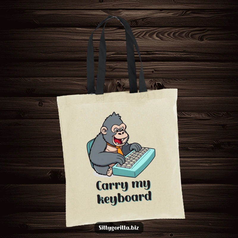 Funny tote bag with a stylized gorilla in a small tie, typing on an oversized keyboard, ideal for carrying work essentials with humor.